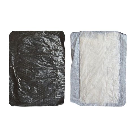 Left: Top of Tray Liner - holes for drainageRight: Bottom of Tray Liner - absorbant pad Left: Top of Tray Liner - holes for drainageRight: Bottom of Tray Liner - absorbant pad