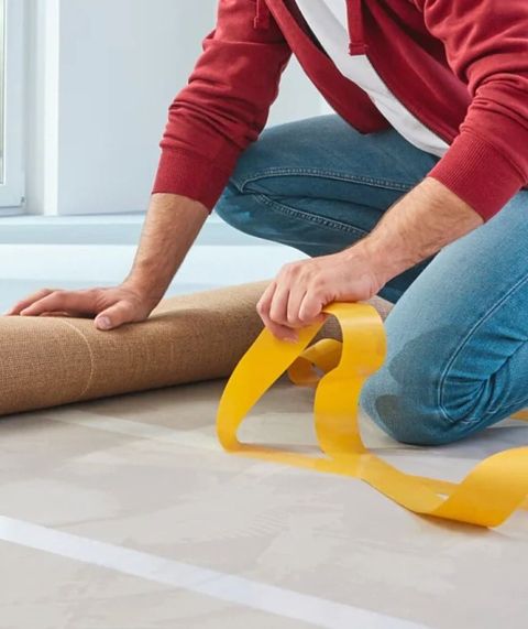 Double-sided-tape-gda-carpet-tape-being-used Double-sided-tape-gda-carpet-tape-being-used